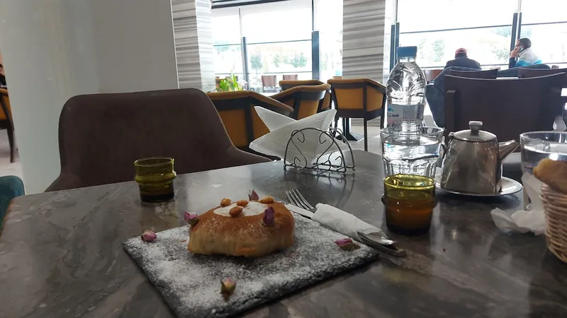 صورة 4 من Arômes & Saveurs