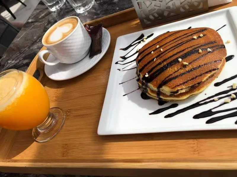 صورة 3 من Arômes & Saveurs