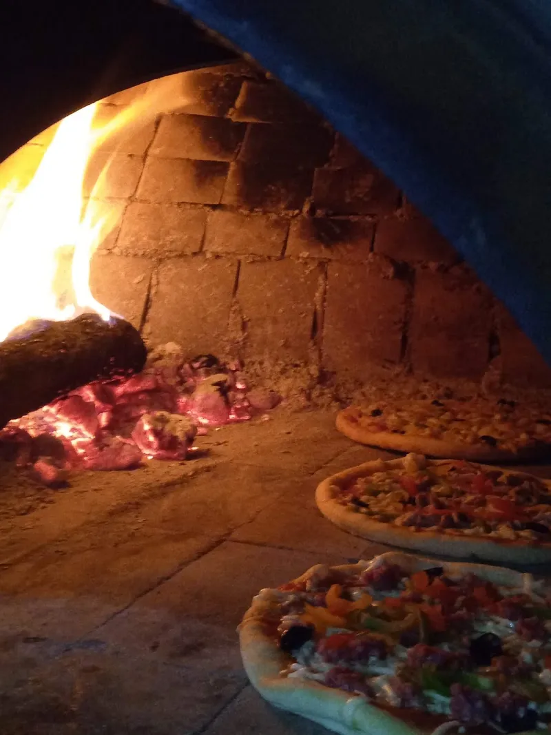 صورة 3 من Délice pizza au bois
