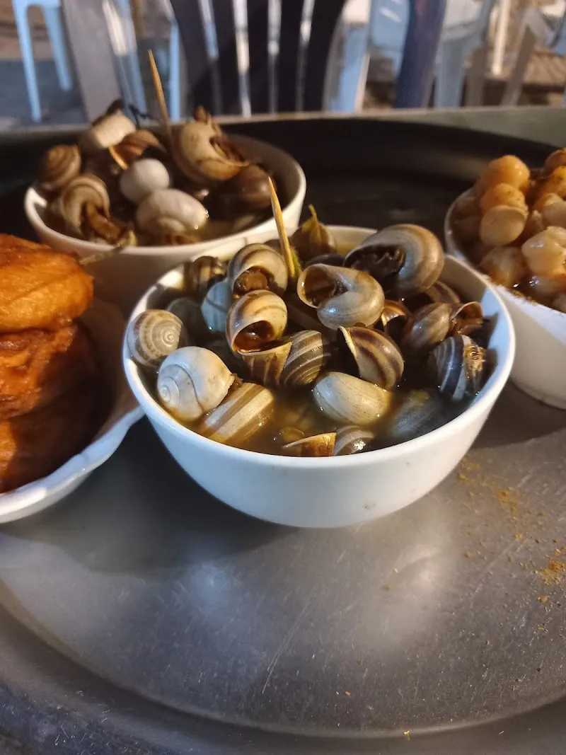 Photo 1 de Place des Marchands d'Escargots