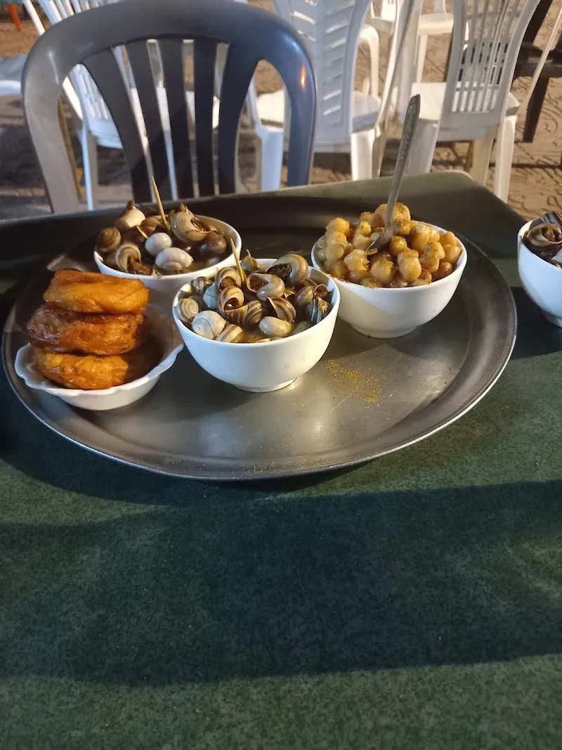 Photo 2 de Place des Marchands d'Escargots