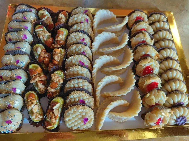 Photo 1 de حلويات العائلة