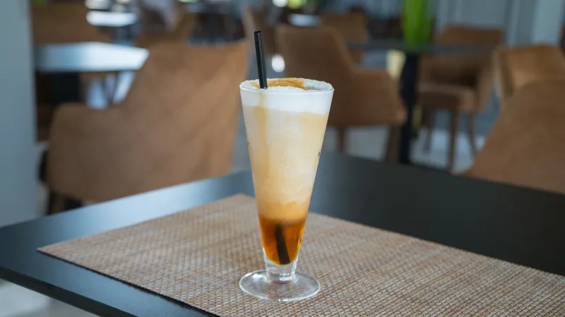 صورة 4 من Dominium Café