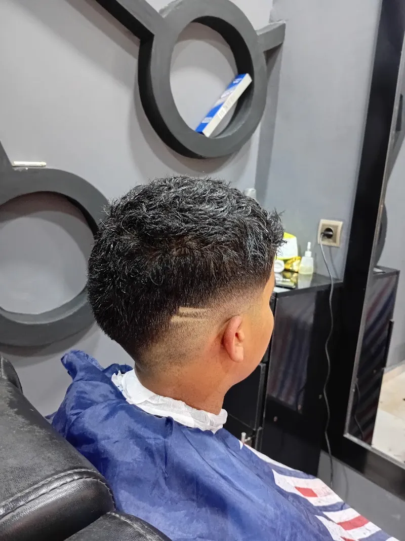 Photo 1 de Barbero