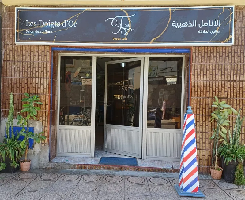 Photo 1 de Barber : Les Doigts d'Or